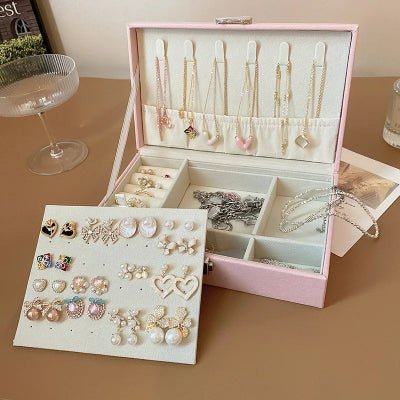 boite à bijoux rose cuir compartiment boucle d'oreilles