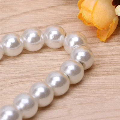 cintres gros plans sur perles