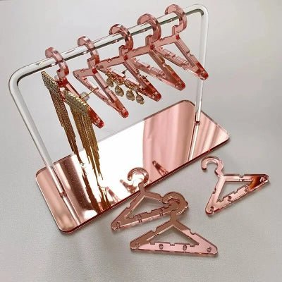 porte boucle d'oreille acrylique rose