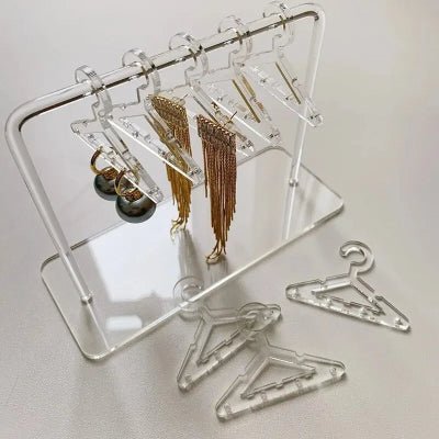 porte boucle d'oreille plastique clair
