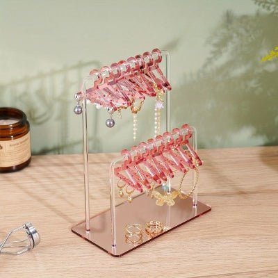 porte boucle d'oreille rose à deux couches